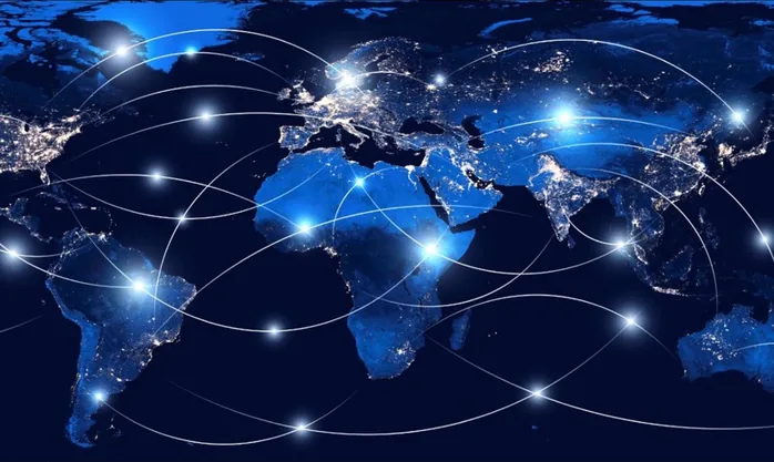A night-lit world map with trade routes arcing between global hubs